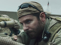 Clint Eastwood's war drama earns £2.5m in its second week to secure first place.