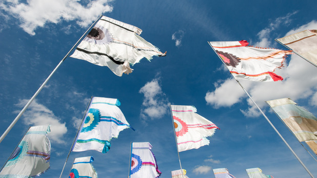 Glastonbury Festival flags at the West Holds stage at Glastonbury Festival 2015