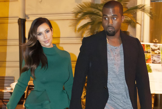 Kim Kardashian and Kanye West arrive back at their hotel in Rome